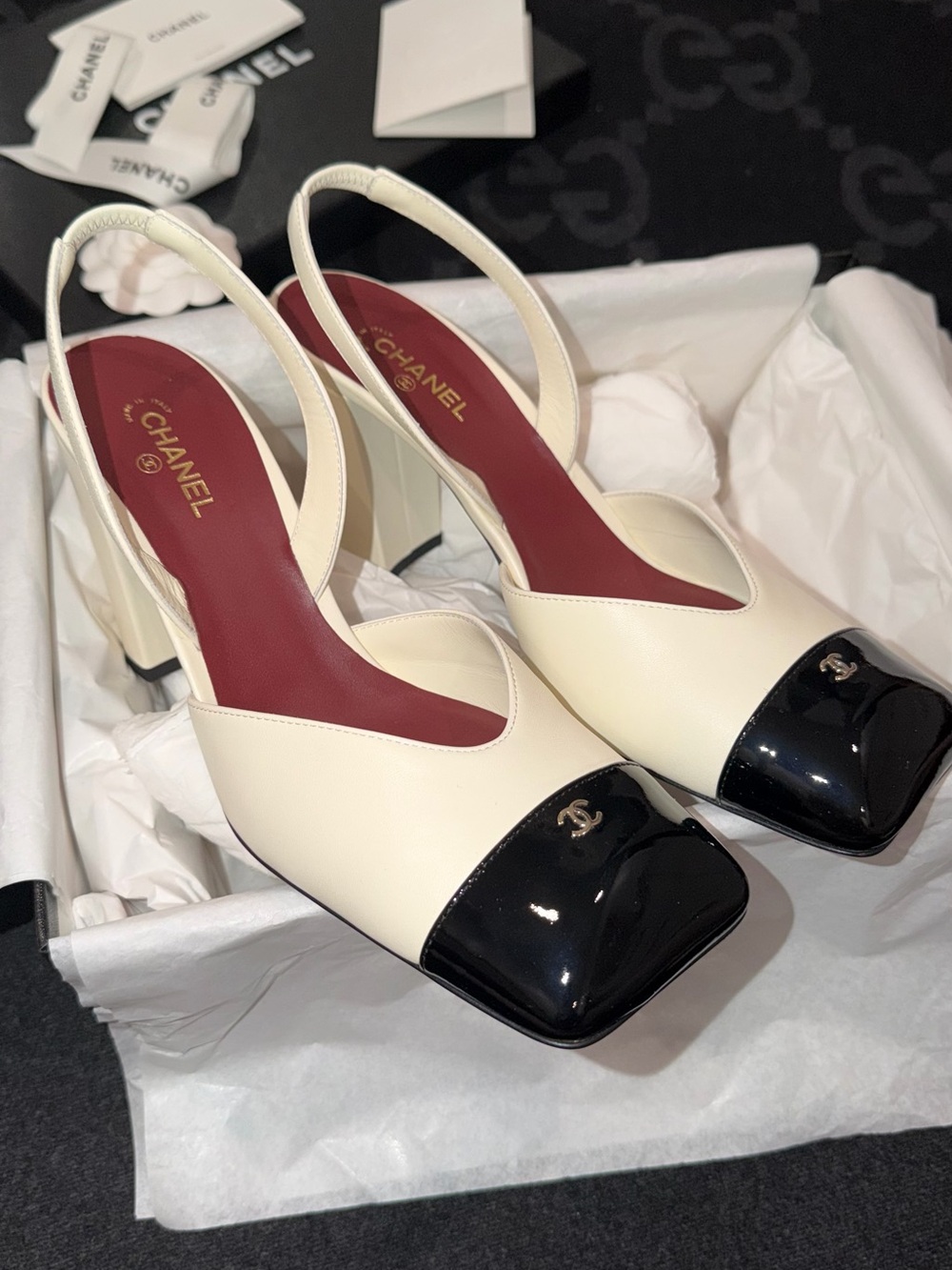 CHANEL Ivory Leather Slingback Pumps with Black Cap Toe SPRING SUMMER 2026